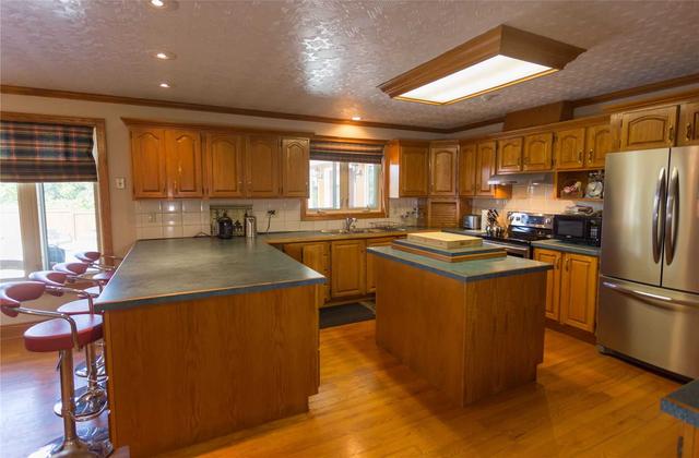 10420 Russell Rd, House detached with 4 bedrooms, 5 bathrooms and 26 parking in Scugog ON | Image 14