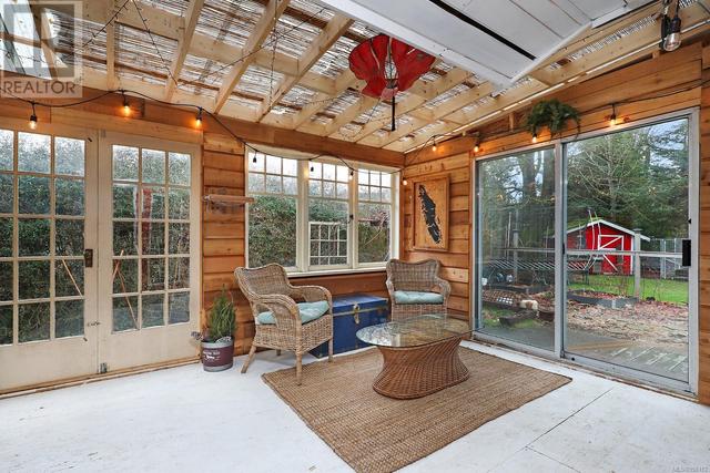 Huge sunroom is great for your plants and for you to enjoy extra living space and sunlight without getting exposed to the elements | Image 14