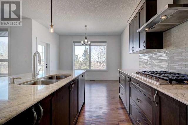 40 Drake Landing Heights, House detached with 4 bedrooms, 3 bathrooms and 2 parking in Okotoks AB | Image 11