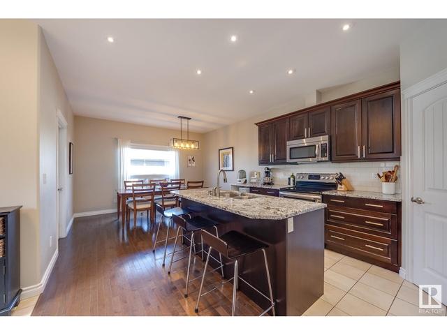 7744 81 Av Nw, House semidetached with 4 bedrooms, 3 bathrooms and null parking in Edmonton AB | Image 2