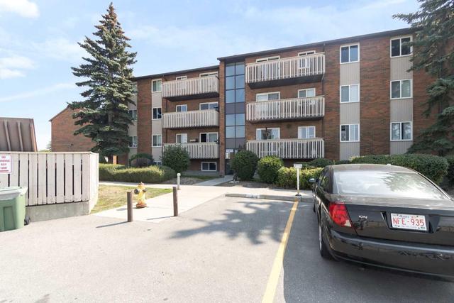 404 - 11620 Elbow Drive Sw, Condo with 2 bedrooms, 1 bathrooms and 1 parking in Calgary AB | Image 1