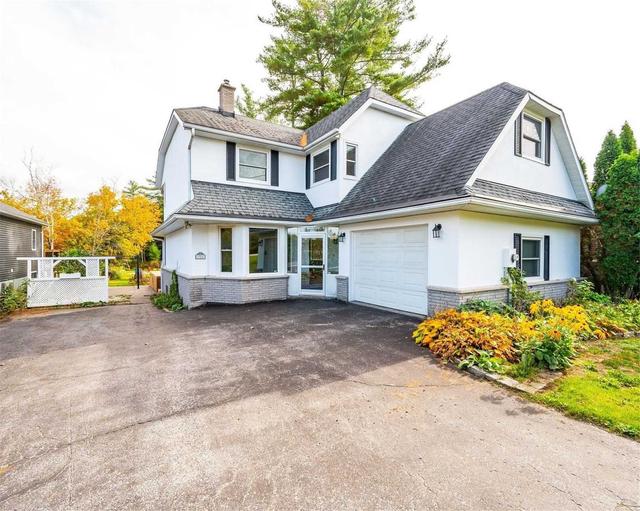 326 Bethune Dr N, Home with 4 bedrooms, 3 bathrooms and 9 parking in Gravenhurst ON | Image 1