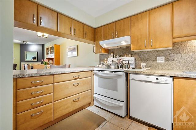Kitchen with lots of cabinetry. | Image 8