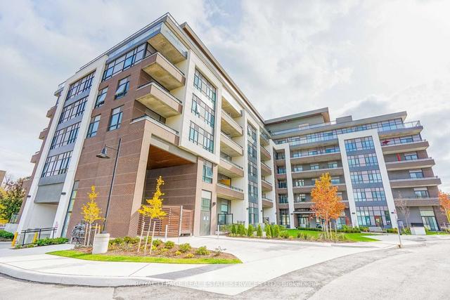 211 - 1 Neighbourhood Lane, Condo with 2 bedrooms, 2 bathrooms and 1 parking in Toronto ON | Image 1