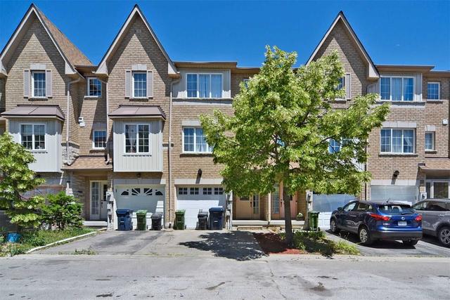 39 Norman Wesley Way, Townhouse with 3 bedrooms, 2 bathrooms and 2 parking in Toronto ON | Image 1