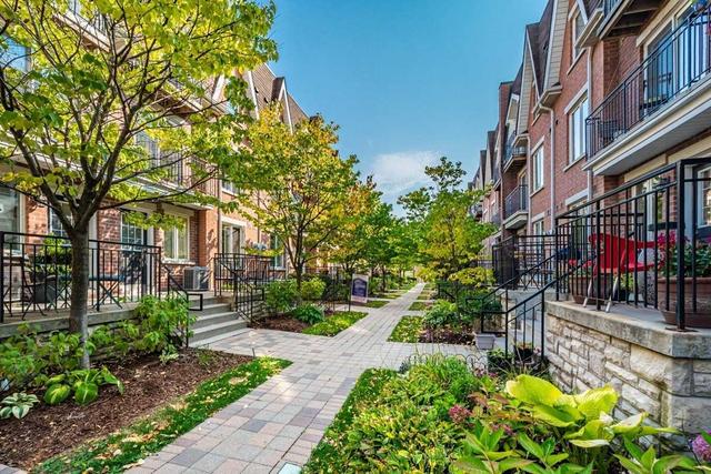 215 - 50 Joe Shuster Way, Townhouse with 3 bedrooms, 3 bathrooms and 1 parking in Toronto ON | Image 1