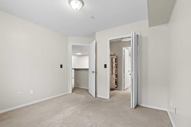 1124 - 60 Panatella Street Nw, Condo with 2 bedrooms, 2 bathrooms and 1 parking in Calgary AB | Image 12
