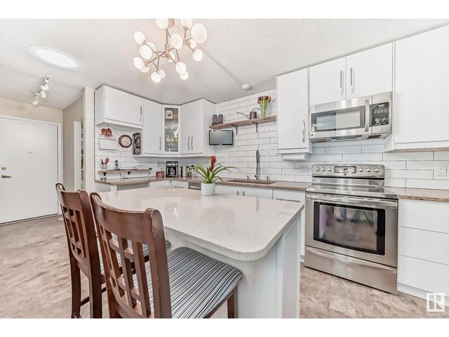 147 Knottwood Rd N Nw, House attached with 2 bedrooms, 2 bathrooms and null parking in Edmonton AB | Image 2
