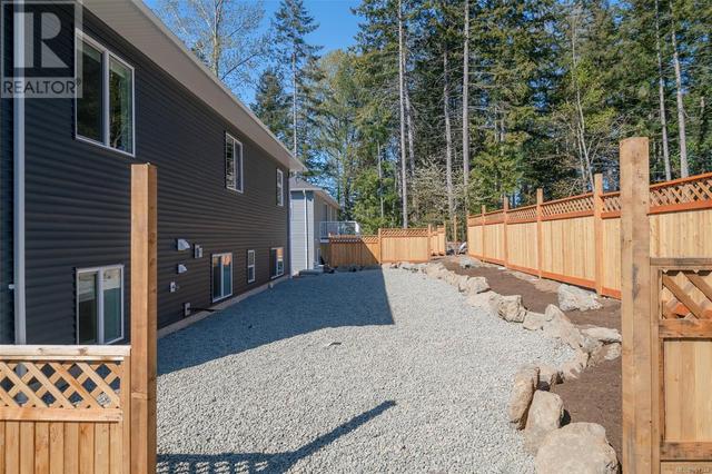 2462 Rosstown Rd, House detached with 6 bedrooms, 4 bathrooms and 4 parking in Nanaimo BC | Image 9