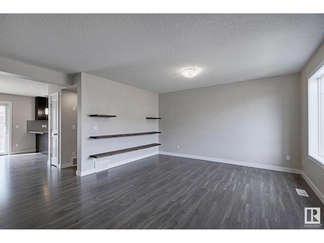 100 - 9535 217 St Nw, House attached with 3 bedrooms, 2 bathrooms and null parking in Edmonton AB | Image 3