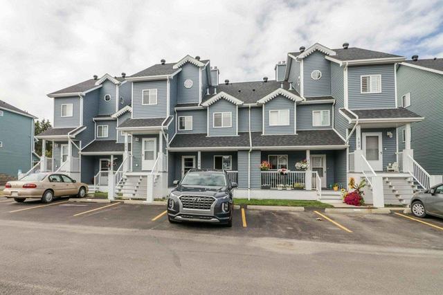 103 - 5220 50a Avenue, Home with 3 bedrooms, 2 bathrooms and 1 parking in Red Deer County AB | Image 5