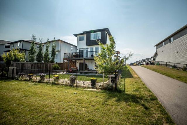 499 Greywolf Cove N, House detached with 4 bedrooms, 3 bathrooms and 4 parking in Lethbridge AB | Image 2
