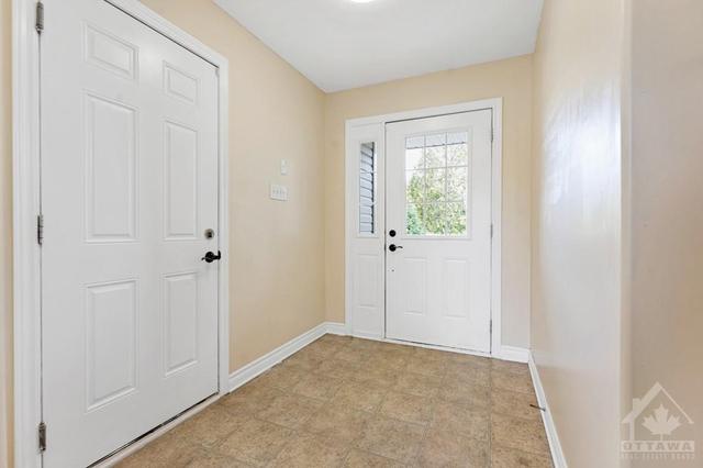 Welcoming front floyer with large closet | Image 6