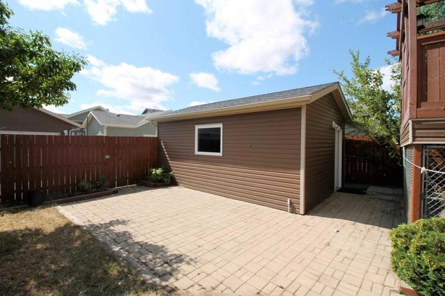 808 Mt Sundance Lane W, House detached with 4 bedrooms, 3 bathrooms and 3 parking in Lethbridge AB | Image 27
