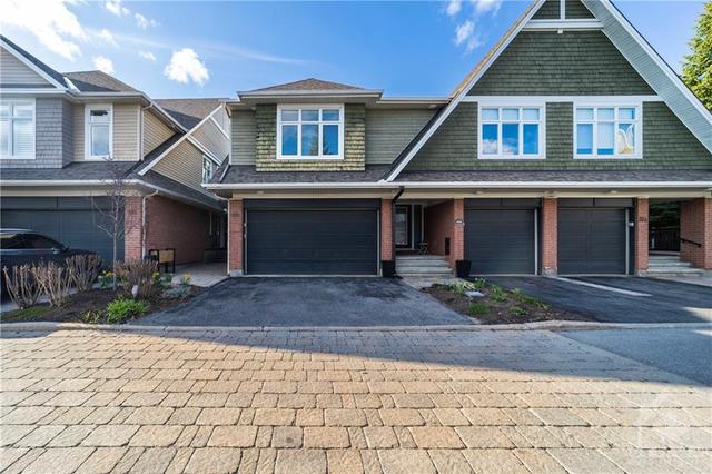 108 Manorhill Private, Townhouse with 2 bedrooms, 3 bathrooms and 4 parking in Ottawa ON | Image 1