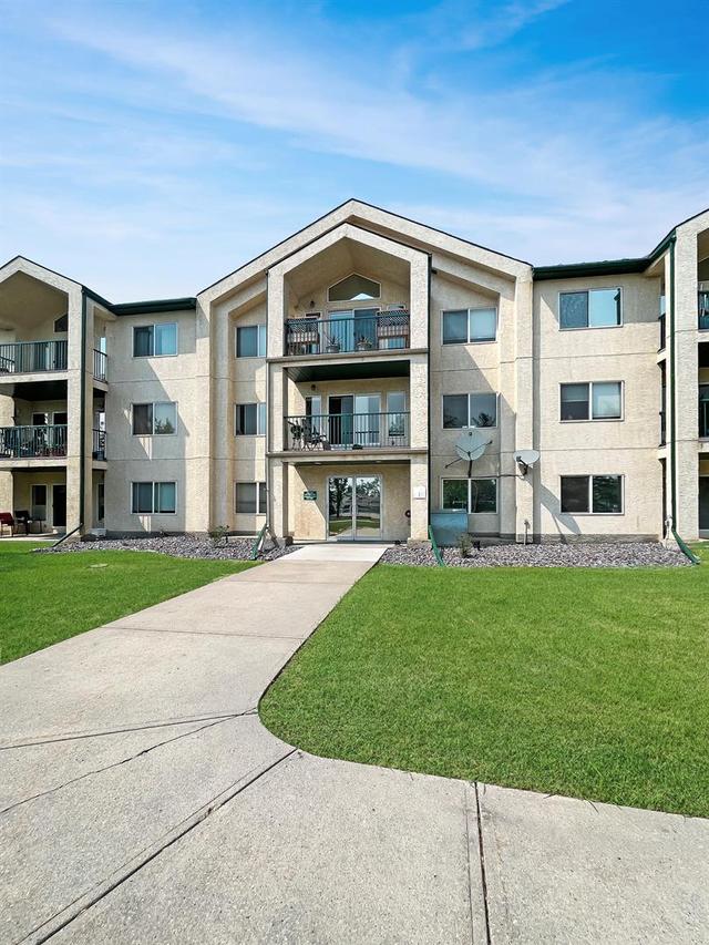 207 - 9111 104 Avenue, Condo with 2 bedrooms, 2 bathrooms and 1 parking in Grande Prairie AB | Image 2