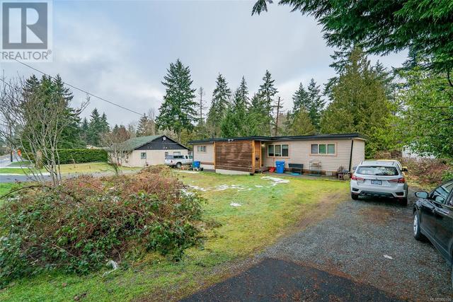 5654 Metral Dr, House detached with 4 bedrooms, 2 bathrooms and 4 parking in Nanaimo BC | Image 28