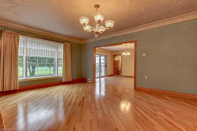 A big living room for the whole family to enjoy! Hardwood floors, large window. | Image 5