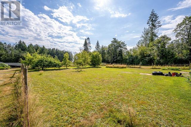 8185 Island Hwy S, House detached with 4 bedrooms, 4 bathrooms and 6 parking in Comox Valley A BC | Image 62