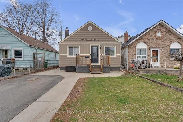 319 Brunswick St, House detached with 2 bedrooms, 2 bathrooms and 2 parking in Hamilton ON | Image 1