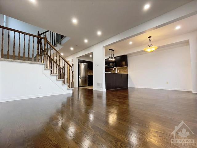 244 Macoun Circle, Townhouse with 4 bedrooms, 3 bathrooms and 3 parking in Ottawa ON | Image 11