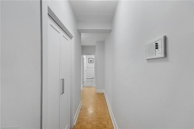 Hallway to the 2 bedrooms and 4-piece bath | Image 5
