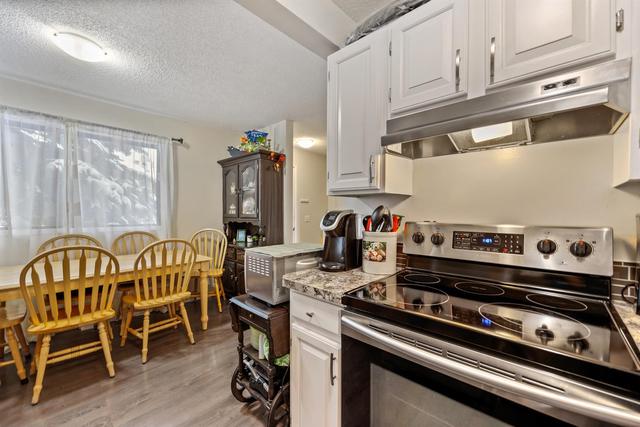 48 - 14736 Deerfield Drive Se, Home with 3 bedrooms, 1 bathrooms and 2 parking in Calgary AB | Image 1