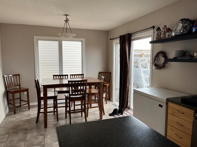 10310 98a Street, House detached with 4 bedrooms, 2 bathrooms and 2 parking in Grande Prairie County No. 1 AB | Image 6