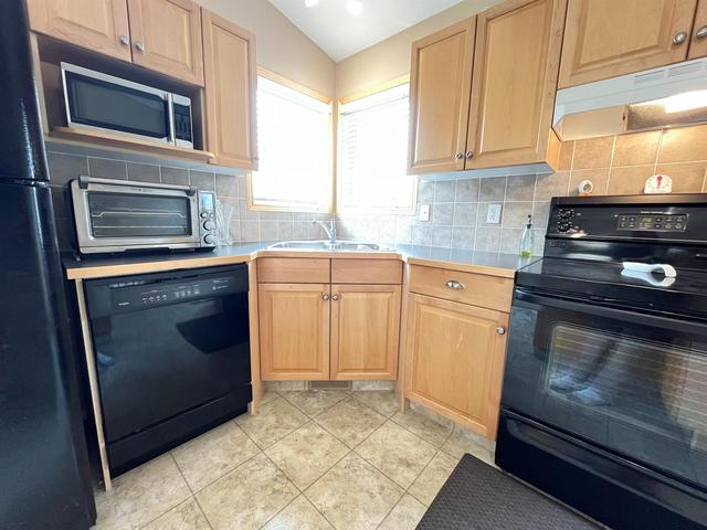 325 Red Crow Boulevard W, House detached with 4 bedrooms, 2 bathrooms and 5 parking in Lethbridge AB | Image 10