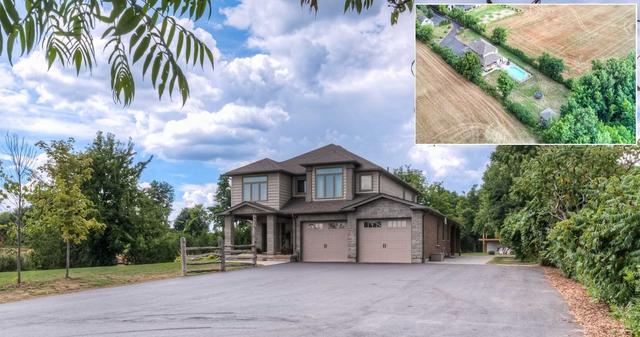 7562 Wellington 36 Rd, House detached with 4 bedrooms, 4 bathrooms and 8 parking in Puslinch ON | Image 1