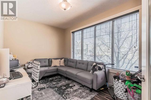 128 Mike Ralph Way Sw, House detached with 4 bedrooms, 3 bathrooms and 2 parking in Calgary AB | Image 19