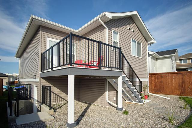 306 Skeena Crescent W, House detached with 2 bedrooms, 2 bathrooms and 3 parking in Lethbridge AB | Image 39