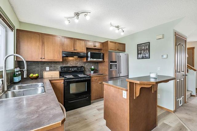 24 Cranberry Way Se, House detached with 3 bedrooms, 1 bathrooms and 2 parking in Calgary AB | Image 2