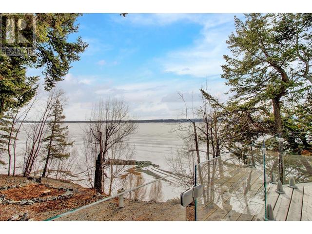3813 Stones Bay Road, House detached with 2 bedrooms, 3 bathrooms and null parking in Bulkley Nechako C BC | Image 32