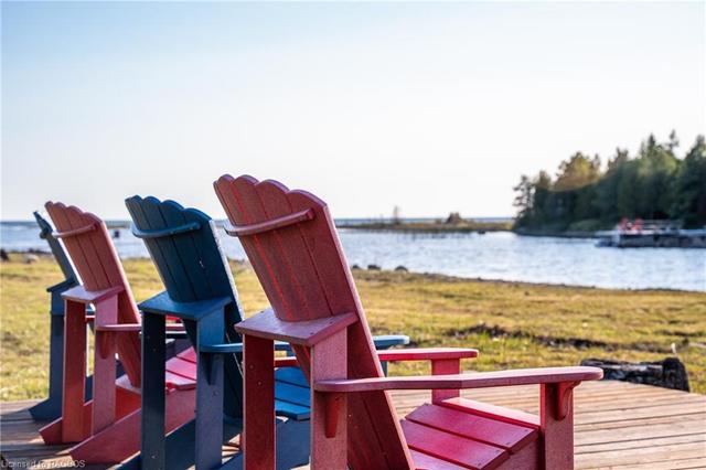 Sit awhile in the newly purchased Adirondackchairs with a. good book. | Image 34