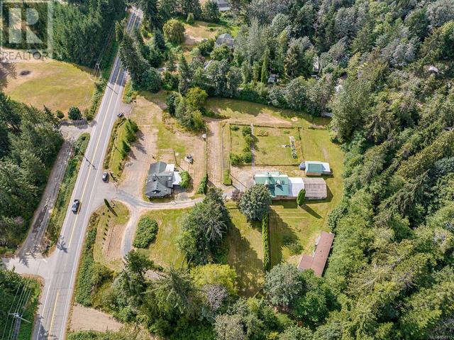 8185 Island Hwy S, House detached with 4 bedrooms, 4 bathrooms and 6 parking in Comox Valley A BC | Image 34