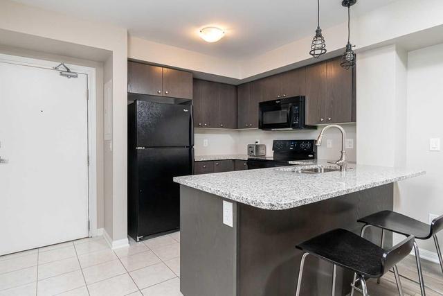 111 - 1045 Nadalin Hts, Condo with 1 bedrooms, 1 bathrooms and 1 parking in Milton ON | Image 2
