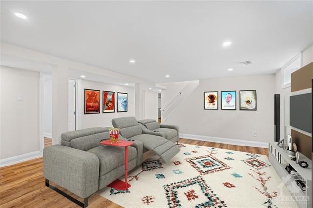 Spacious lower level family room. | Image 19