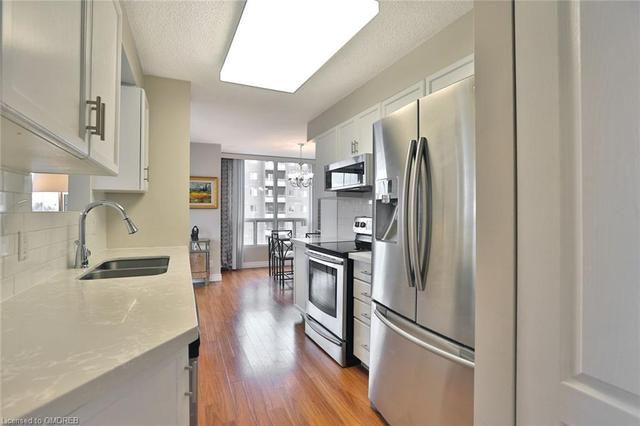 503 - 100 Millside Dr, Condo with 2 bedrooms, 2 bathrooms and 1 parking in Milton ON | Image 24