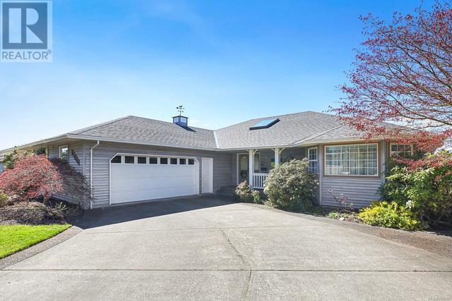 1313 Farquharson Dr, House detached with 5 bedrooms, 5 bathrooms and 2 parking in Courtenay BC | Image 2
