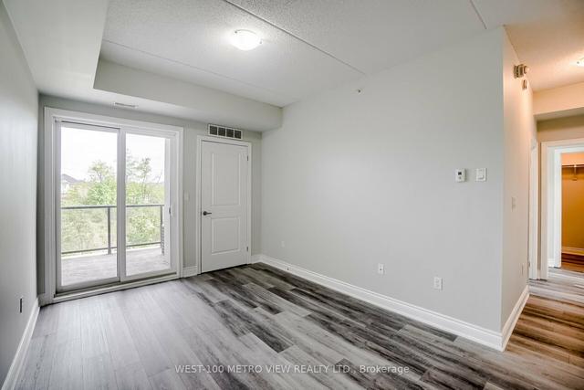 105 - 640 Sauve St, Condo with 2 bedrooms, 2 bathrooms and 1 parking in Milton ON | Image 3