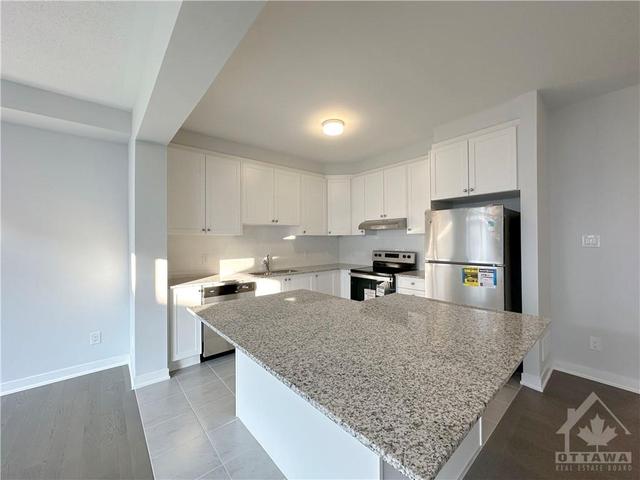2474 Watercolours Way, Townhouse with 3 bedrooms, 3 bathrooms and 2 parking in Ottawa ON | Image 4