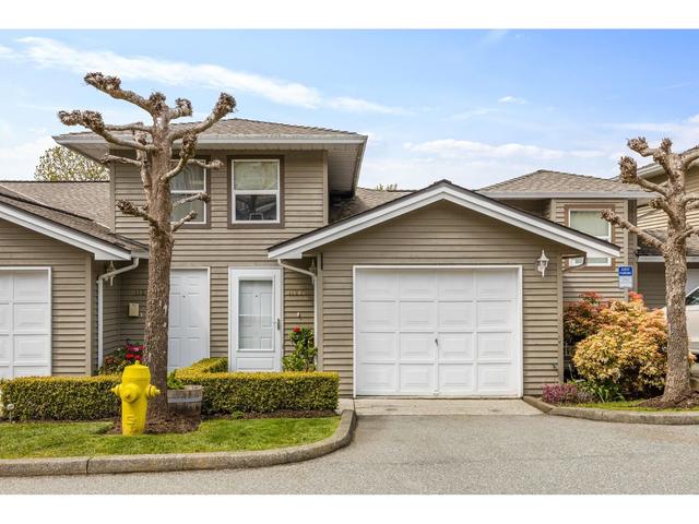 1127 O'flaherty Gate, House attached with 2 bedrooms, 2 bathrooms and null parking in Port Coquitlam BC | Card Image