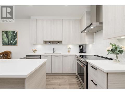 306 - 7133 14 Avenue, Condo with 1 bedrooms, 1 bathrooms and 1 parking in Burnaby BC | Card Image