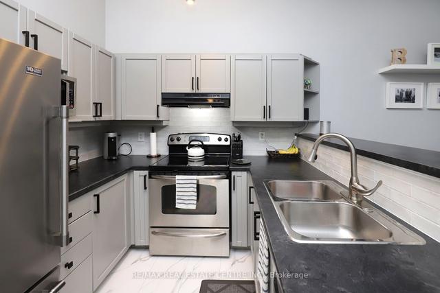 409 - 1380 Main St E, Condo with 2 bedrooms, 1 bathrooms and 4 parking in Milton ON | Image 21