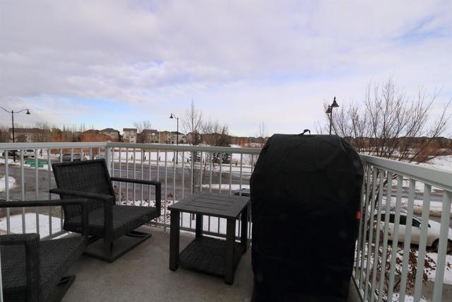 617 Auburn Bay Boulevard Se, Home with 2 bedrooms, 2 bathrooms and 2 parking in Calgary AB | Image 2