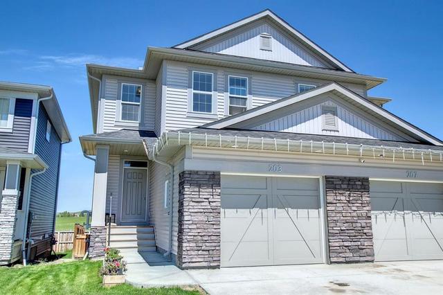 203 Heritage Heights, House semidetached with 3 bedrooms, 2 bathrooms and 2 parking in Cochrane AB | Card Image