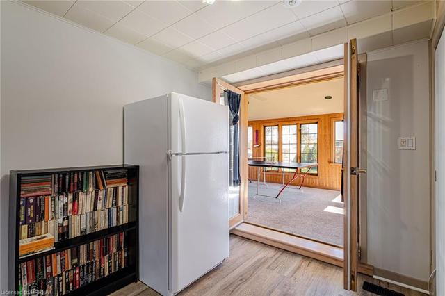 Bonus room on the main level provides great storage with a double closet to the right | Image 17