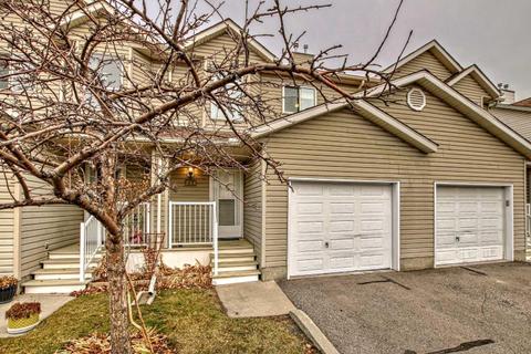 214 Mt Douglas Manor Se, Home with 3 bedrooms, 1 bathrooms and 2 parking in Calgary AB | Card Image