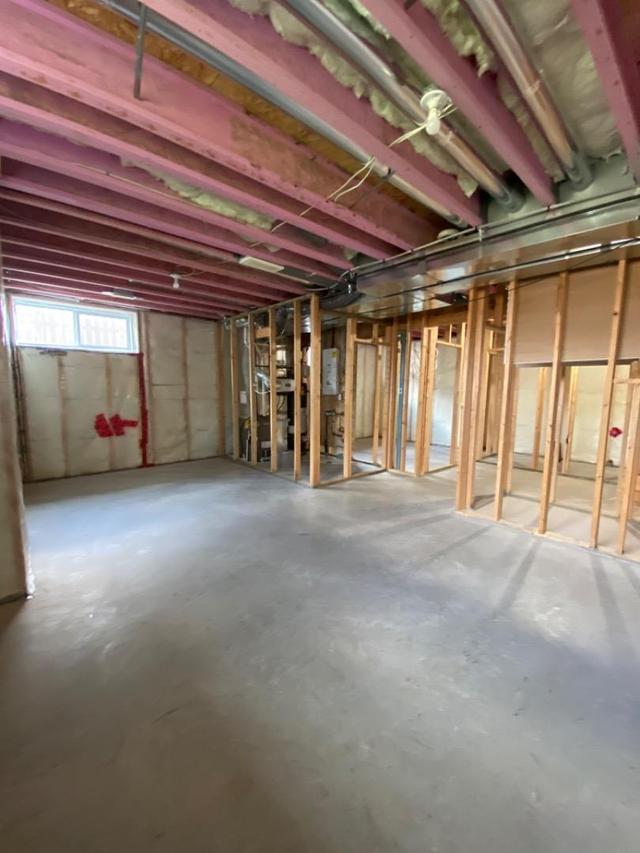 basement, shows rough in for infloor heating,  water tank, etc | Image 24